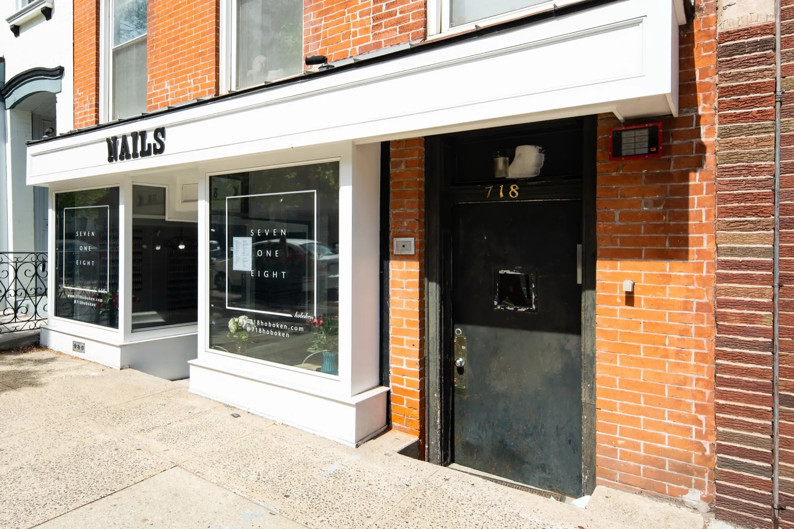 Storefront and entrance at 718 Washington Street